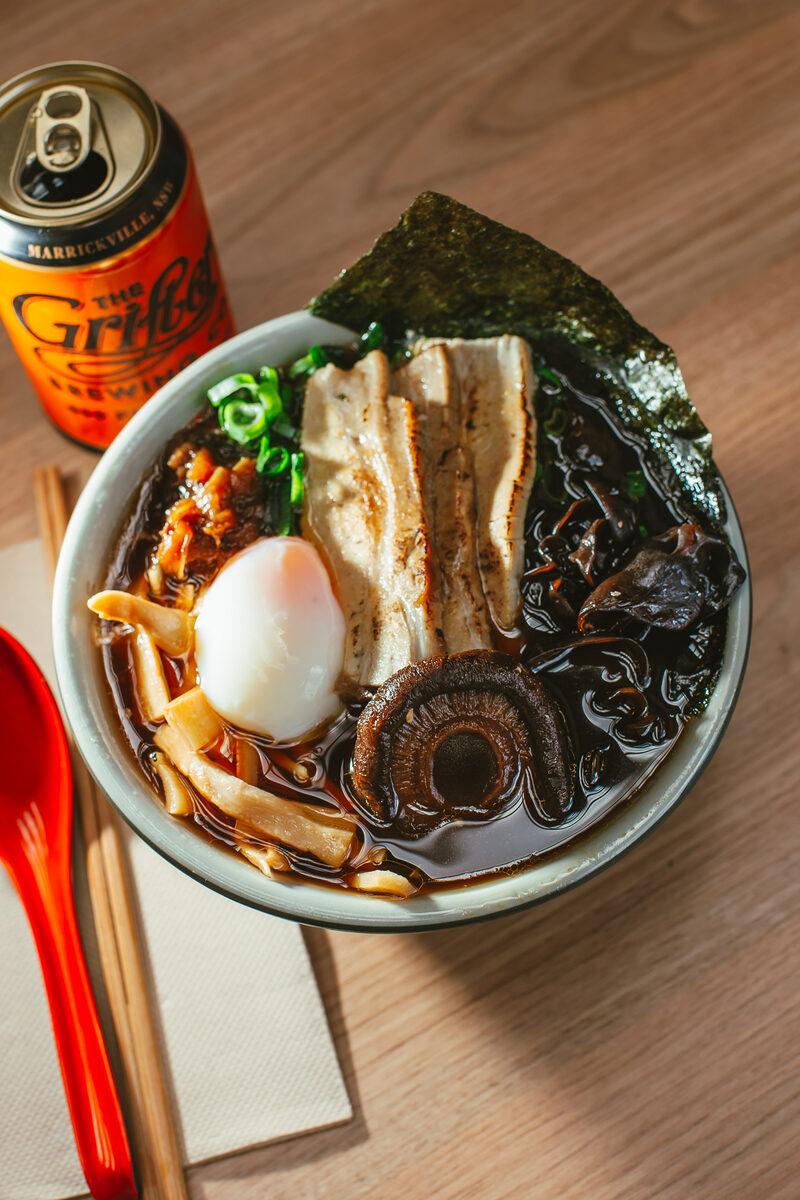 Ramen bowl with pork belly and beer at Rising Sun Workshop